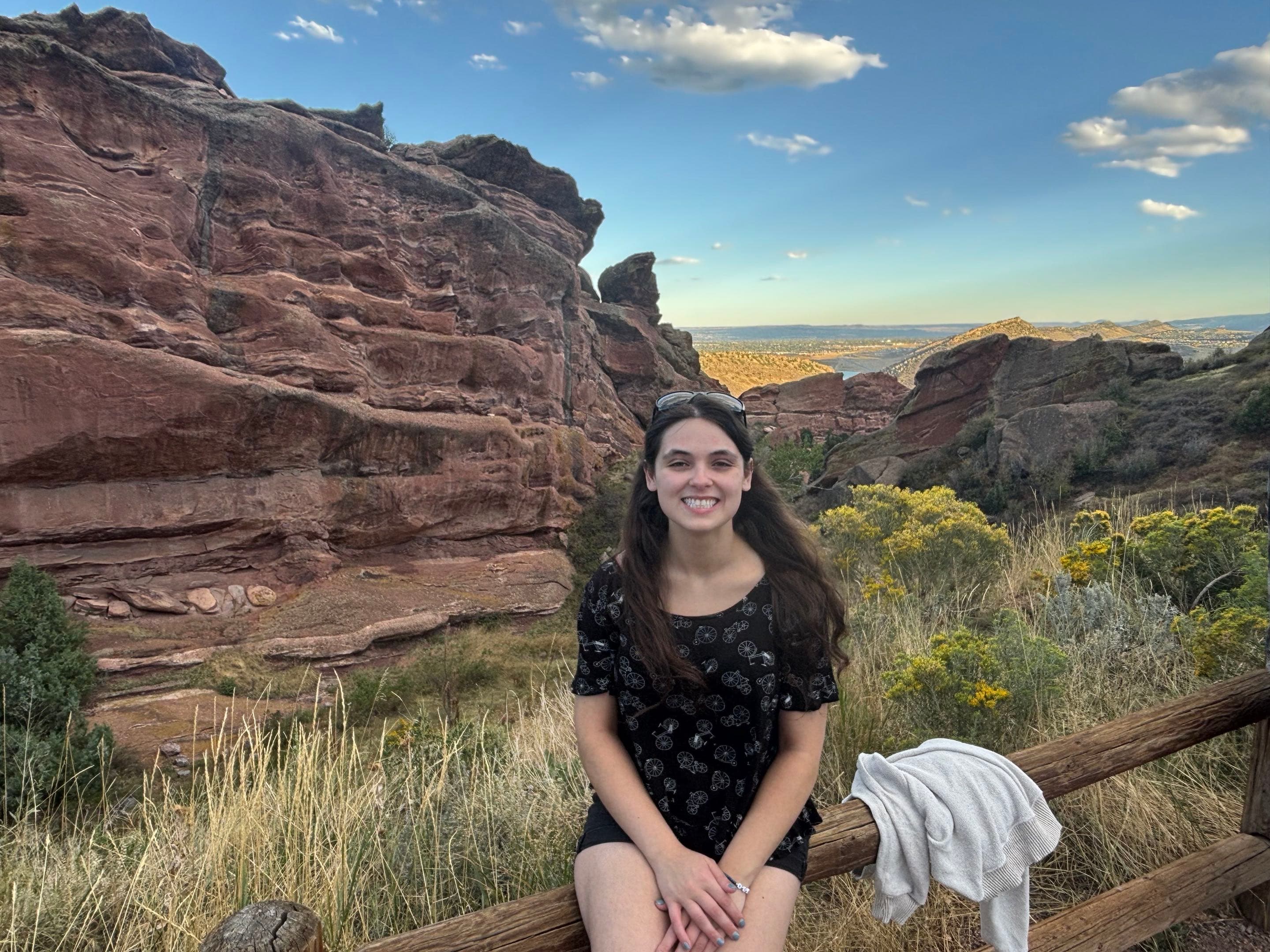Kristin Kirchner smiling outdoors in front of red rock formations
